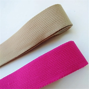 Close-up of durable woven webbing straps in khaki and hot pink with thick texture