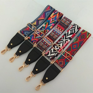 Close-up of bohemian wide bag straps with geometric patterns and gold alloy hooks