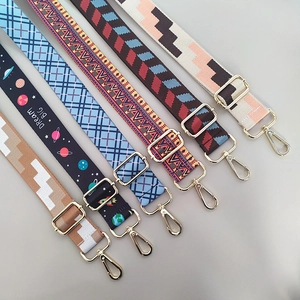 Ethnic style adjustable wide shoulder straps with gold hardware and colorful patterns