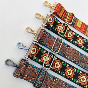 Adjustable ethnic style woven bag strap with colorful patterns and metal swivel hooks