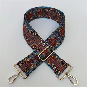 Adjustable bohemian style replacement bag strap with geometric ethnic pattern and gold buckle