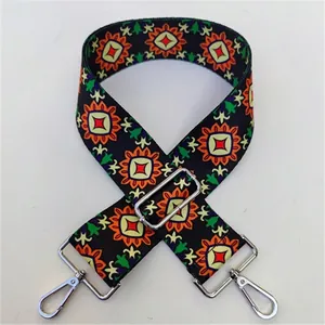 Close-up of No. 26 ethnic style wide shoulder strap with silver buckle and sunflower pattern