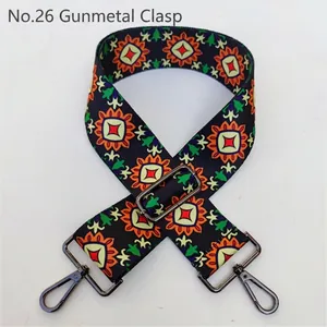 Ethnic style bag strap with orange geometric patterns and gunmetal swivel hooks
