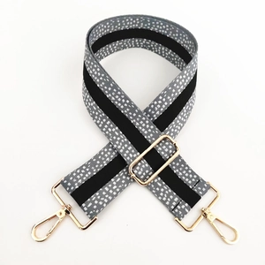 Adjustable 5cm wide gray woven purse strap with white polka dots and gold metal hooks