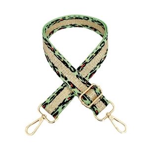 Detailed view of mint green leopard pattern strap with gold thread and alloy buckles