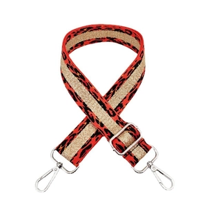 Close-up of leopard pattern strap with gold glitter stripe and silver swivel hooks