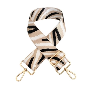 Close-up of zebra pattern wide replacement strap with gold metal lobster swivel hooks