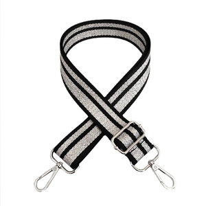 Detailed view of adjustable 3.8cm black and silver striped woven replacement bag strap