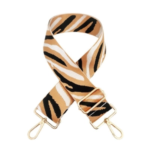 Close-up of zebra pattern wide strap with shiny gold lobster clasps and metal buckle