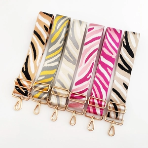 Adjustable wide zebra pattern shoulder straps with gold metal hooks in multiple colors