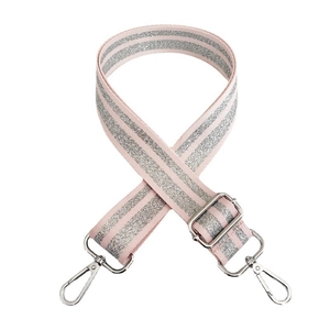 Close-up of pink and silver sequin adjustable shoulder strap with metal swivel hooks