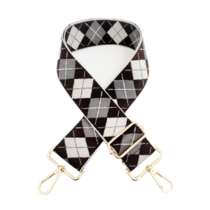 Adjustable wide replacement bag strap with black and white argyle pattern and gold hooks
