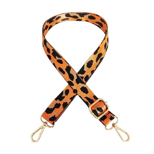 Detail of leopard print bag strap with golden metal swivel hooks and adjustable buckle