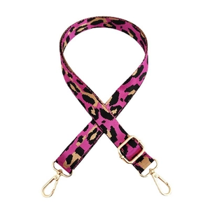 Adjustable leopard print bag strap in vibrant rose pink with gold metal buckles