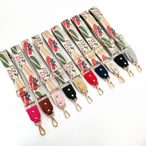 Adjustable floral jacquard wide shoulder strap with multi-color leather ends and gold metal hooks