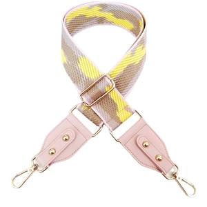 Adjustable wide shoulder strap for bags with pink camo pattern and gold metal hooks