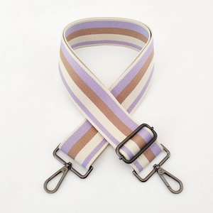 Close-up of 5cm wide striped cotton strap with dark metal swivel hooks and adjuster buckle