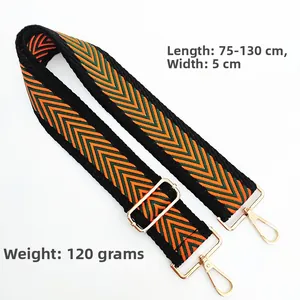 Close-up of 5cm wide orange-green chevron woven strap with adjustable gold lobster clips