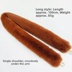 Brown faux fur shoulder strap with gold lobster clasps and 100cm length measurement