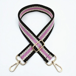 Detail of adjustable 3.8cm purple and black woven strap with gold metal lobster clasps