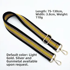 Close-up of 3.8cm geometric woven strap with adjustable gold hardware, length 75-130cm