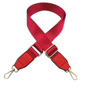 Detail of red nylon replacement bag strap with golden lobster clasps and leather ends