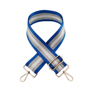 Detail of blue and silver striped 5cm wide replacement bag strap with gold metal lobster clasps