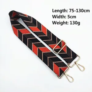 Adjustable 5cm wide jacquard bag strap with orange and black geometric patterns