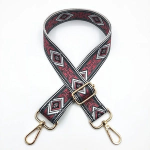 Ethnic geometric pattern woven bag strap with golden metal hooks and adjustable length