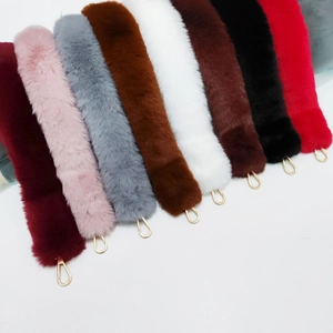 Multiple colors of soft faux fur handbag straps with gold metal lobster clasps