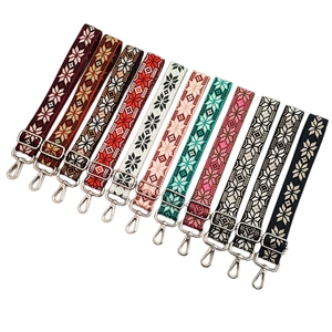 Adjustable woven jacquard bag strap with snowflake pattern and silver metal hooks