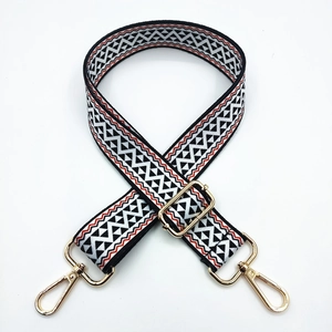 Adjustable wide ethnic shoulder strap with black and white geometric pattern and gold hardware