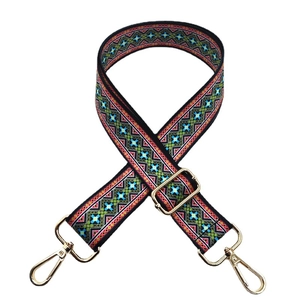 Ethnic wide bag strap with colorful geometric pattern and golden metal hardware