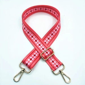 Adjustable wide rose red argyle patterned bag strap with light gold metal lobster clasps