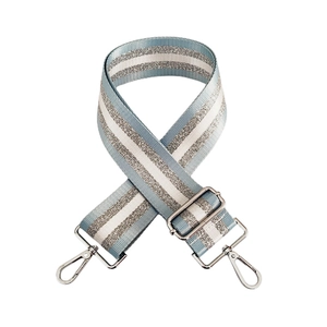 Detail of adjustable blue and silver striped bag strap with shiny metallic swivel hooks