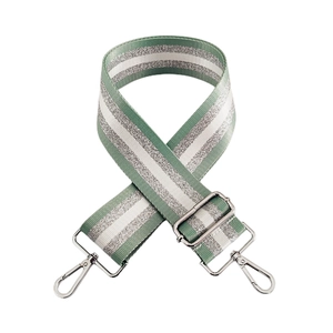 Adjustable green and silver striped nylon bag strap with polished metal lobster clasps