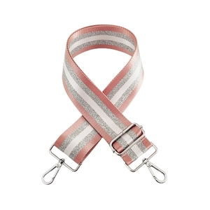 Detail of adjustable pink and silver glitter woven bag strap with metal lobster clasps