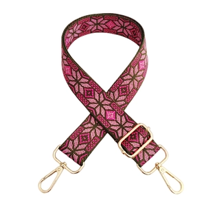 Pink and brown diamond pattern jacquard guitar style strap with gold metal hooks