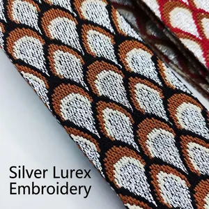 Adjustable wide shoulder strap with silver metallic peacock embroidery and jacquard texture