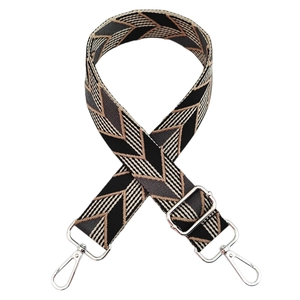 Detail of adjustable geometric chevron woven shoulder strap with silver metal swivel hooks