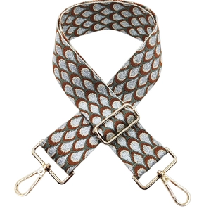 Detail of vintage peacock jacquard wide strap with gold metal lobster clasps