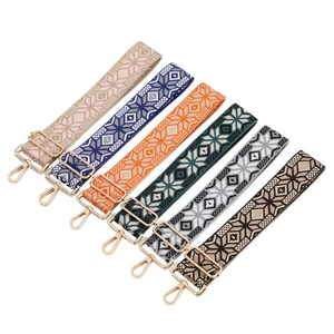 Detail of bohemian jacquard woven shoulder straps with golden metal adjustable buckles