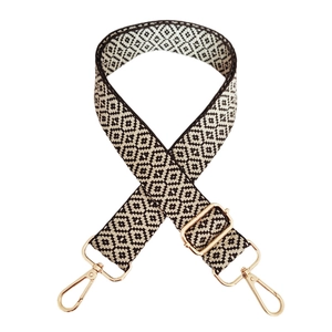 Adjustable black and white geometric diamond pattern embroidered purse strap with gold hardware