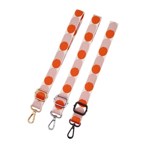 Adjustable narrow shoulder strap for crossbody bags with pink and orange polka dots