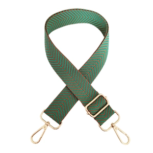 Adjustable wide replacement strap with green and brown V-pattern and gold hardware