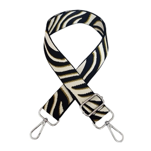 Adjustable wide shoulder strap featuring black and white zebra pattern with gold thread