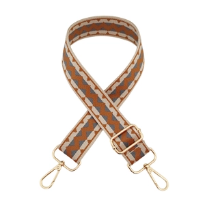 Close-up of wavy pattern woven bag strap with golden metal swivel hooks and buckles