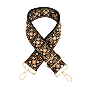 Detail of bohemian geometric jacquard bag strap with durable golden metal lobster clasps