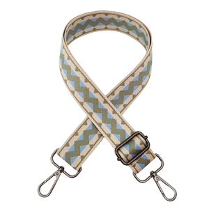 Detail of adjustable woven canvas bag strap with colorful blue and green wave patterns
