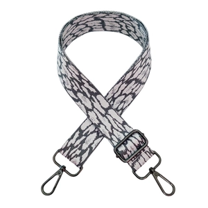 Close-up of leopard print replacement shoulder strap with metal swivel hooks for bags